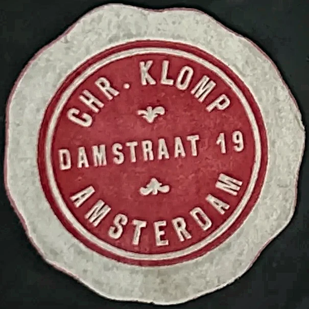 Sluitzegel Chr. Klomp – Damstraat 19, Amsterdam