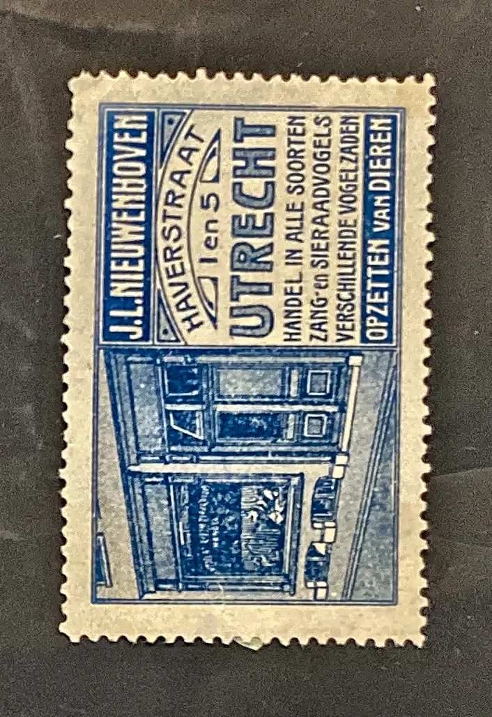 Reclamesluitzegel J.L. Nieuwenhoven – Vogel- en dierenhandel Utrecht