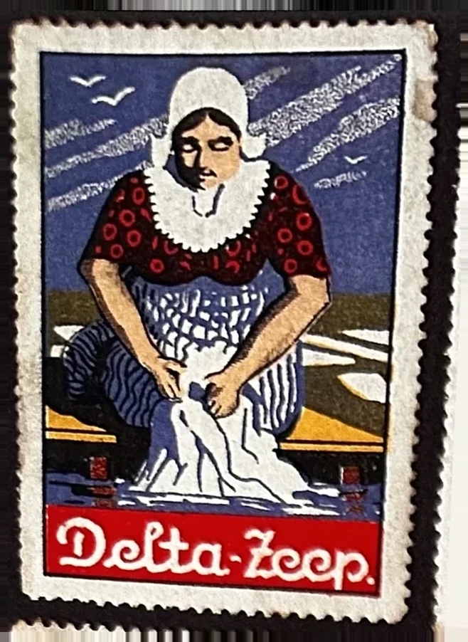 Delta-Zeep — vrouw in klederdracht wassend